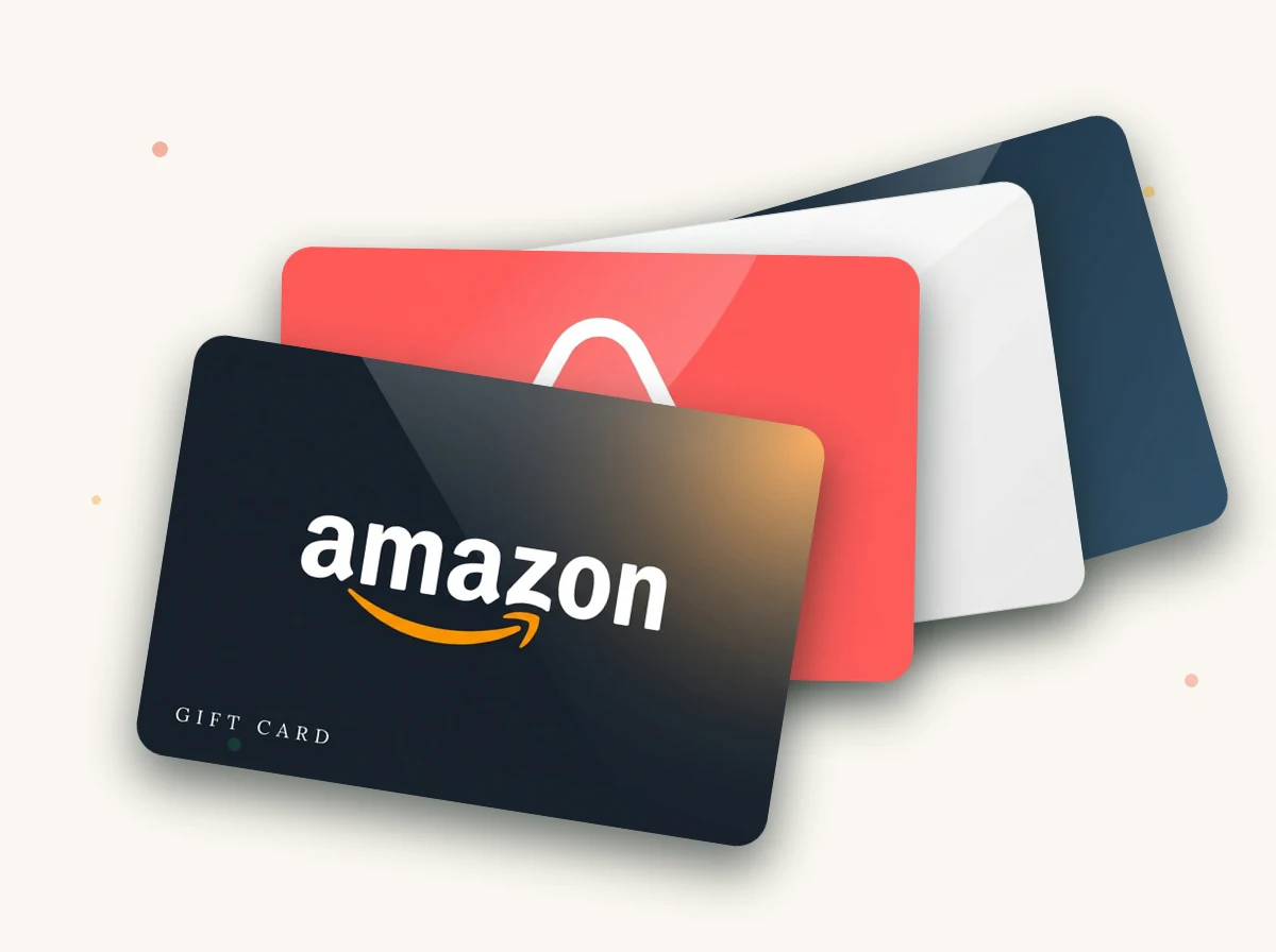 A fan of gift cards wrapped with a coral ribbon